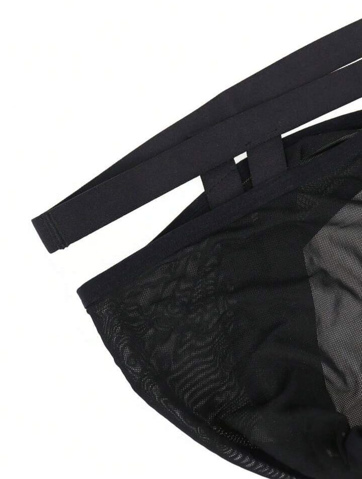 Sheer mesh cage brief in black